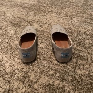 Women’s gray name brand Toms, size: 6